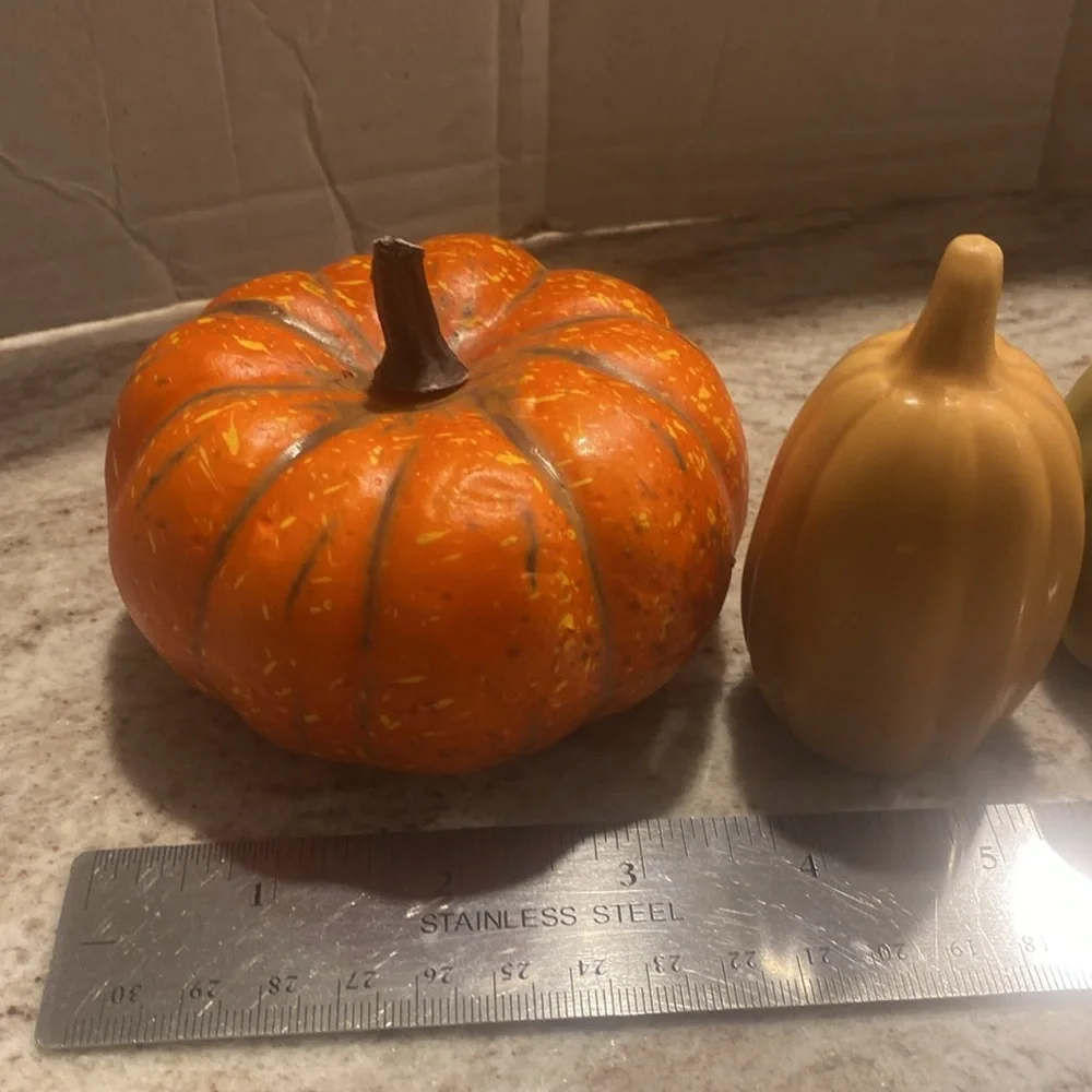 Set of 4 festive pumpkins. Great for fall decorating. Various sizes & materials.
